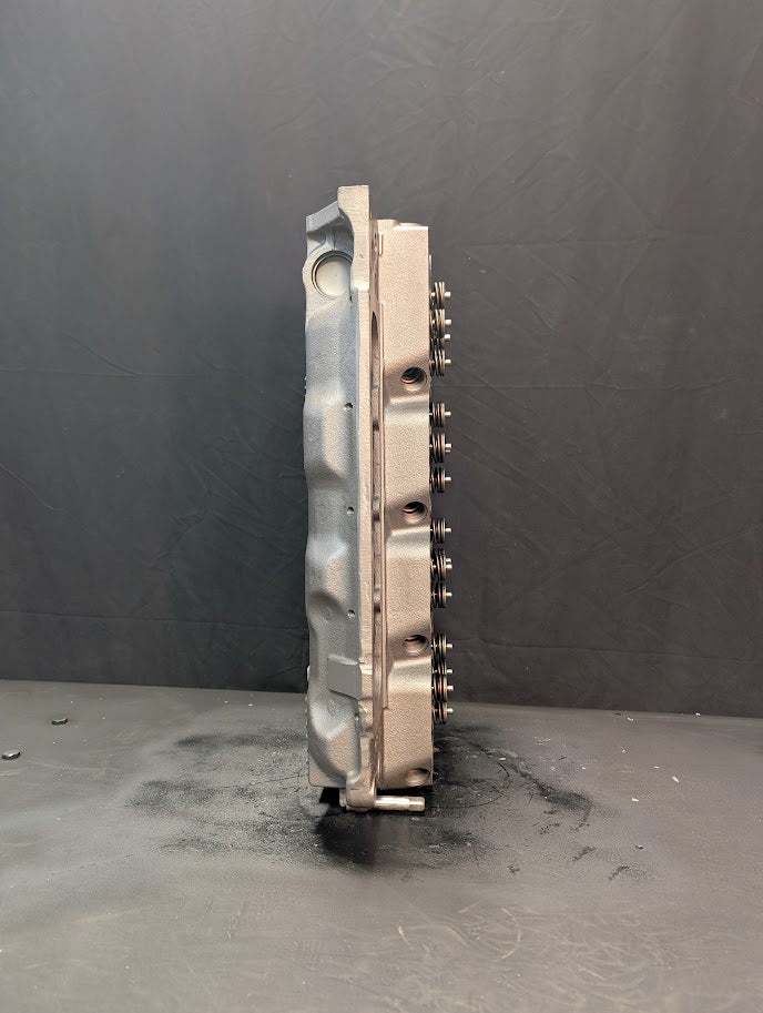 REBUILT CUMMINS 4.5L 4 VALVE CYLINDER HEAD # 4929283