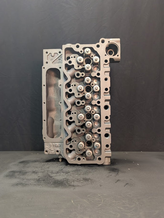 REBUILT CUMMINS 4.5L 4 VALVE CYLINDER HEAD # 4929283