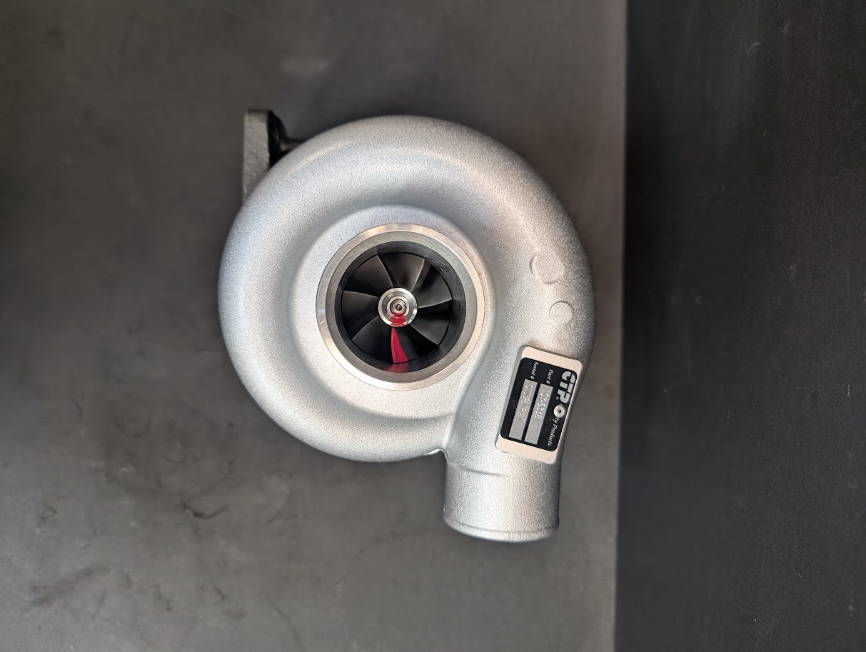 NEW CAT 3046 TURBOCHARGER W/NARROW FOOT MARMON FLANGE FOOT ON EXHAUST OUTLET # 1076338